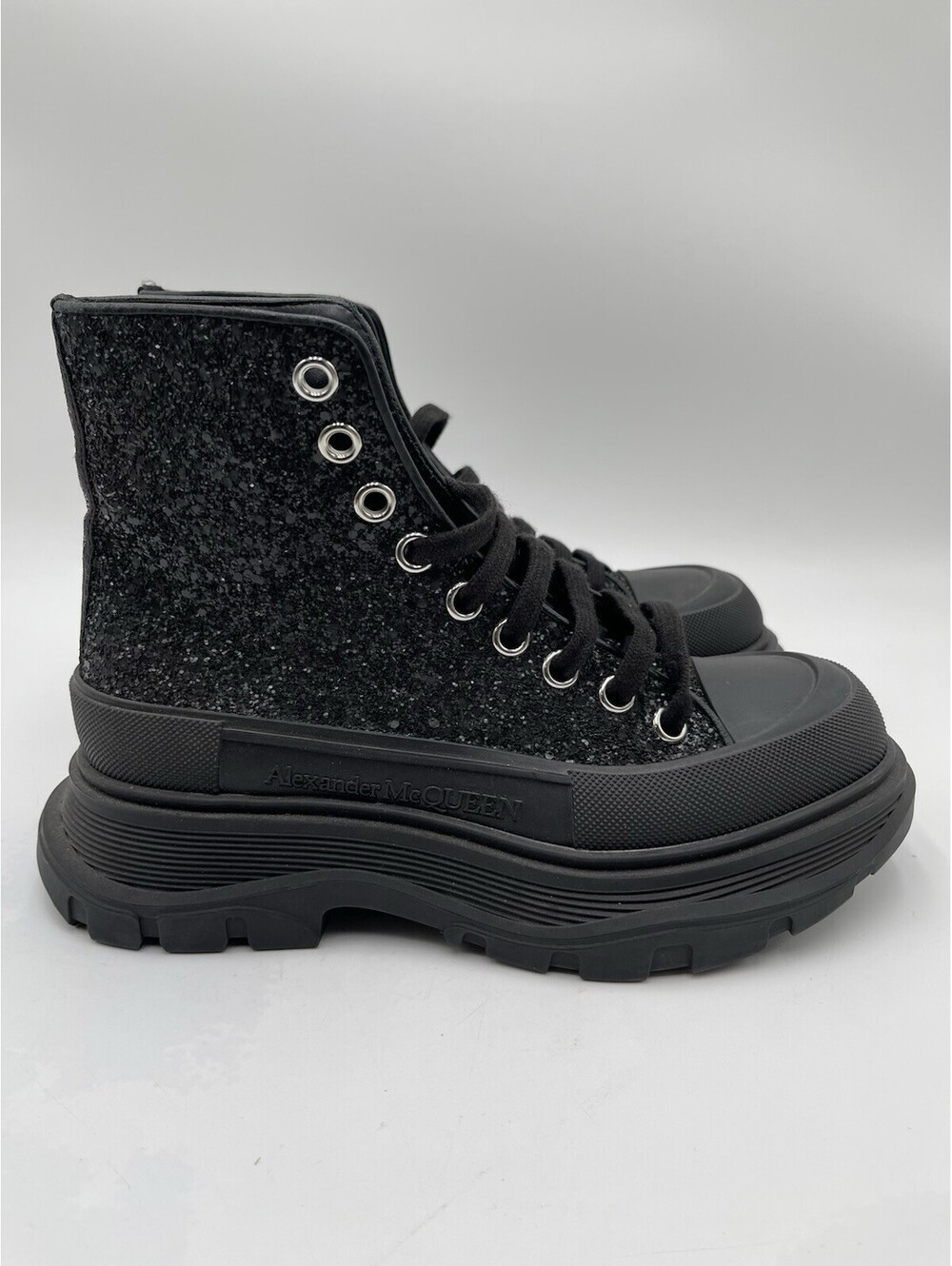 Women’s Alexander McQueen Tread Slick boots in black glitter Size 37